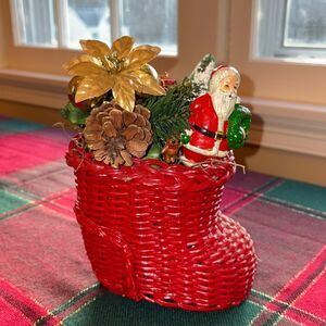 Vintage wicker stocking with Santa tree presents